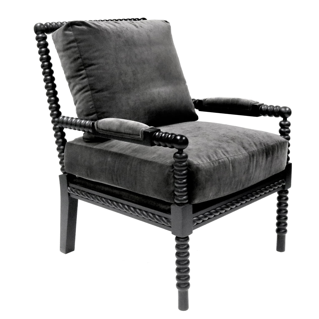 Black spindle armchair with decorative wooden frame on a white background