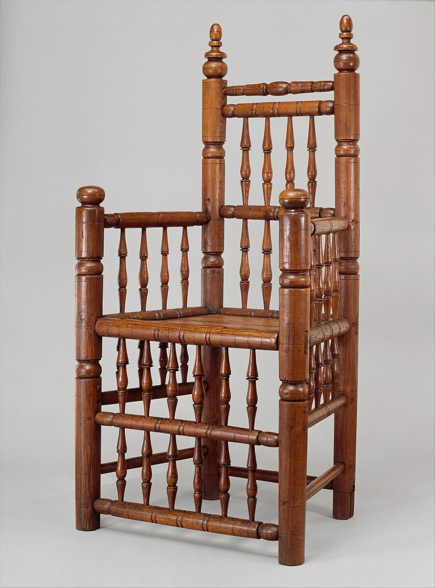 A Brewster-style spindle-back armchair in ash, made in Massachusetts around 1640 to 1680, with spindles above and below the seat